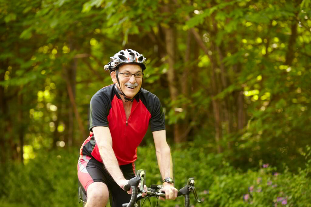 Senior man on bicycle